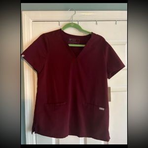 Figs burgundy two pocket scrub top and joggers.